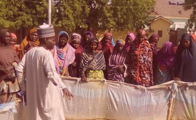 Community members gathered at the Dumsai PHC garden, Yobe State