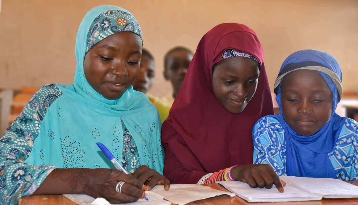 Three girls studying together in a learning centre