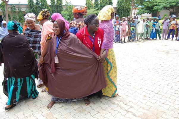 Women gathered at a community outreach event
